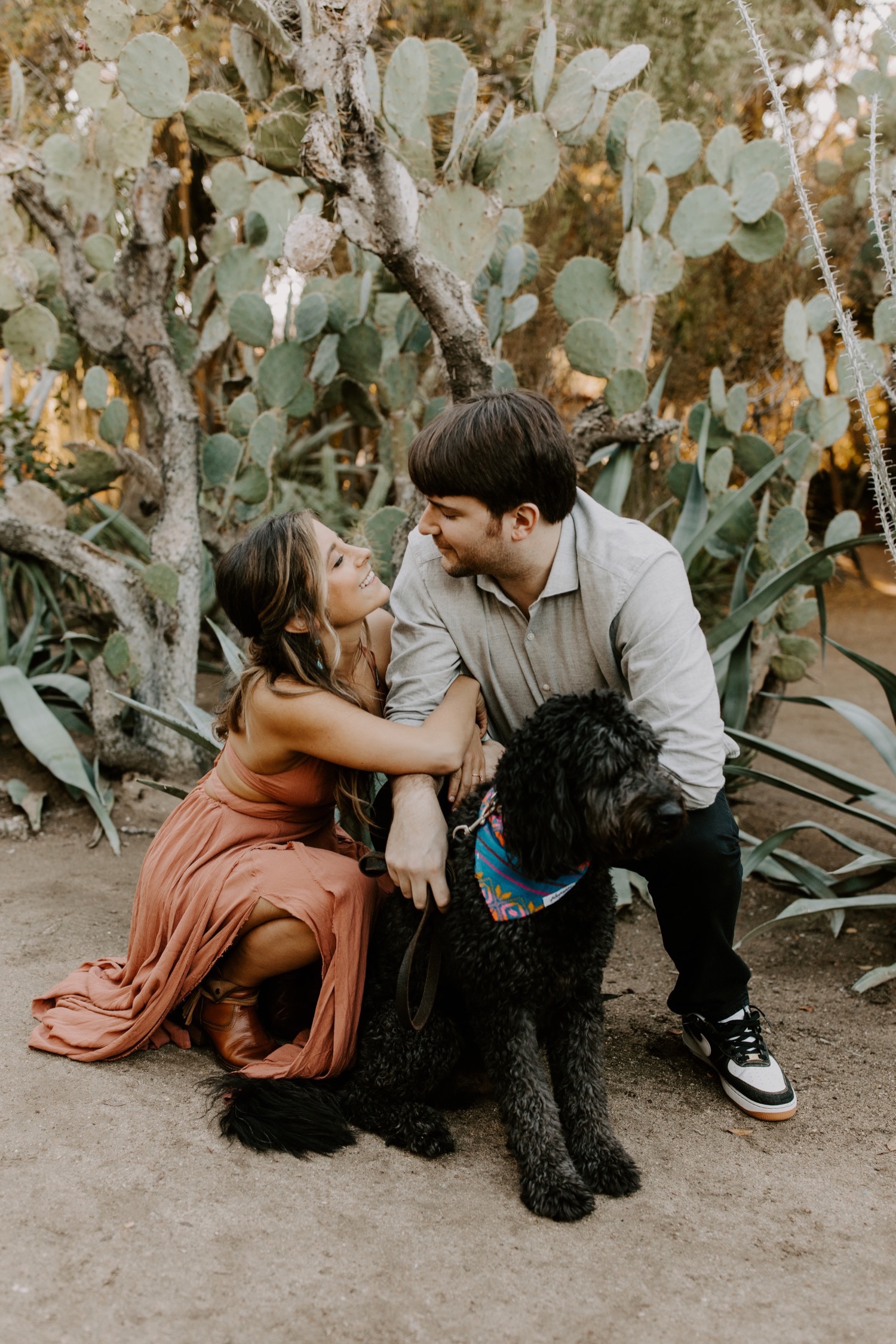 A couples engagement session with their dog in Palm Springs