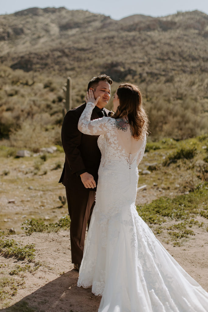 Bride and groom first look in superstition mountains, arizona