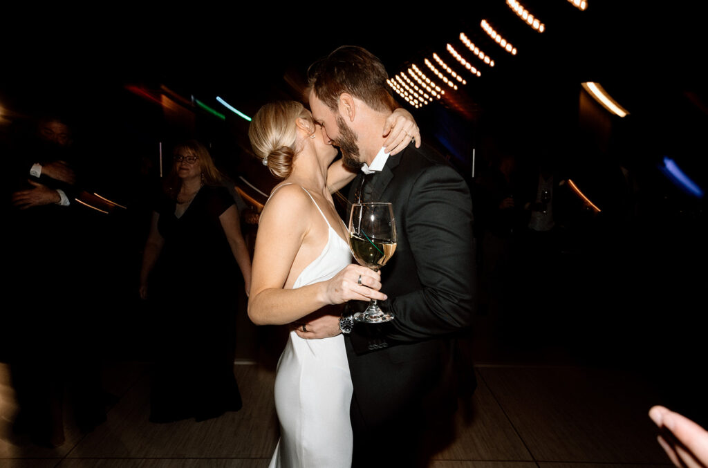 newlyweds have fun on the dancefloor at their wedding reception in Scottsdale